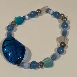 Blue and Aqua Glass Bead Stretchy Bracelet with Large Leaf Focal Bead